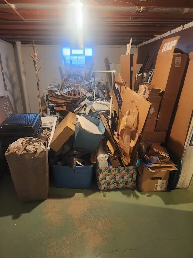 Roll-off dumpster container at job site for Concrete Dumpster Rental in Sullivan